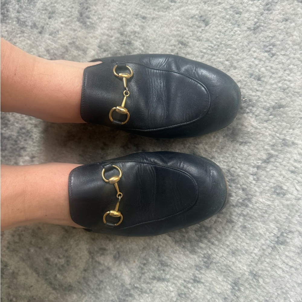 Gucci Women’s Black Leather Slip-On Loafers with Gold Accents